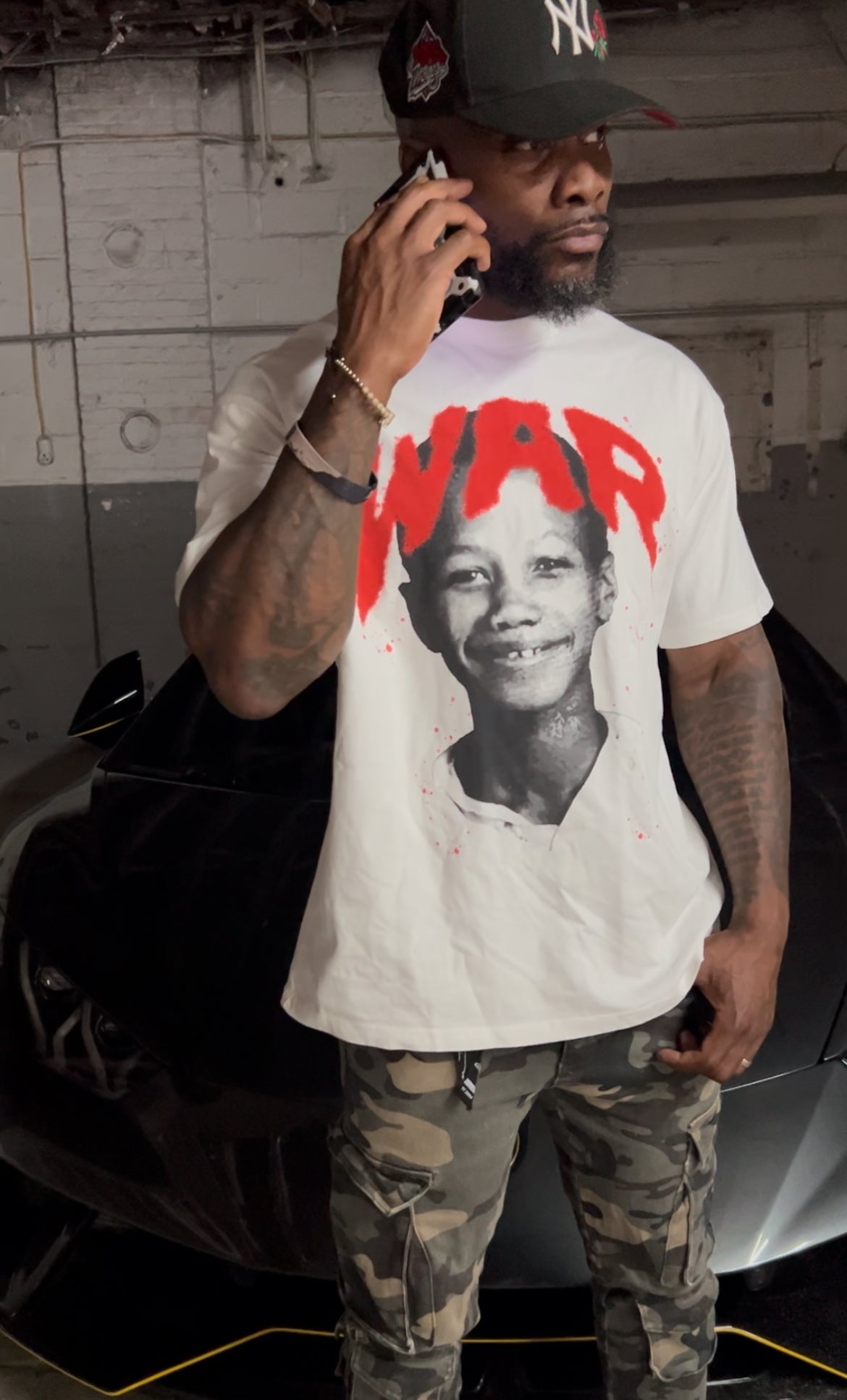 WAR T-Shirt, We Are Resilient, Malcolm X, Young Malcolm X, Positive Affirmation, Motivational Clothing, Inspirational Shirt, Streetwear, Graphic Tee, Oversized T-Shirt, Boxy Fit, Hip Hop Fashion, Urban Wear, Empowerment, Resilience, Strength, Black History, Positive Energy, Manifestation, High Vibe Clothing, Law of Attraction