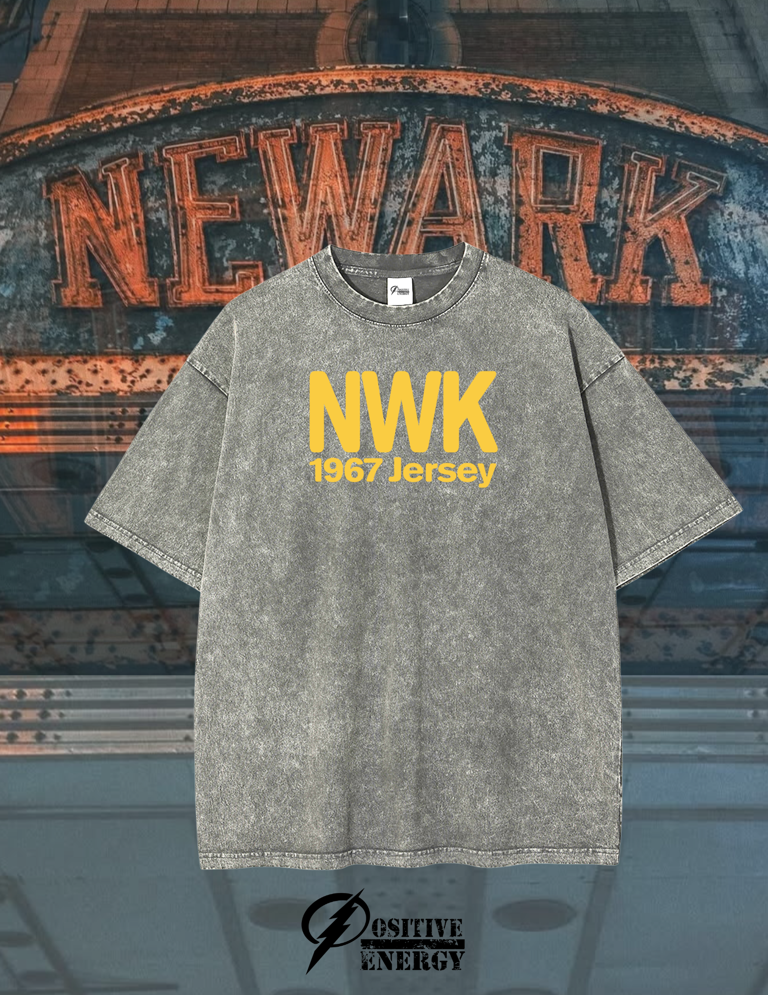 Step into the streets of history with the Positive Energy Black Acid Wash T-Shirt, inspired by Newark, NJ, and the pivotal year of 1967. This limited-edition streetwear tee blends heritage, resilience, and raw style into a piece that’s as bold as the city it represents. Crafted from premium cotton with a vintage acid wash finish, the shirt delivers a lived-in feel that speaks to authenticity. The distressed black tones echo the grit of Newark’s underground culture, while the minimalist yet powerful graphic 