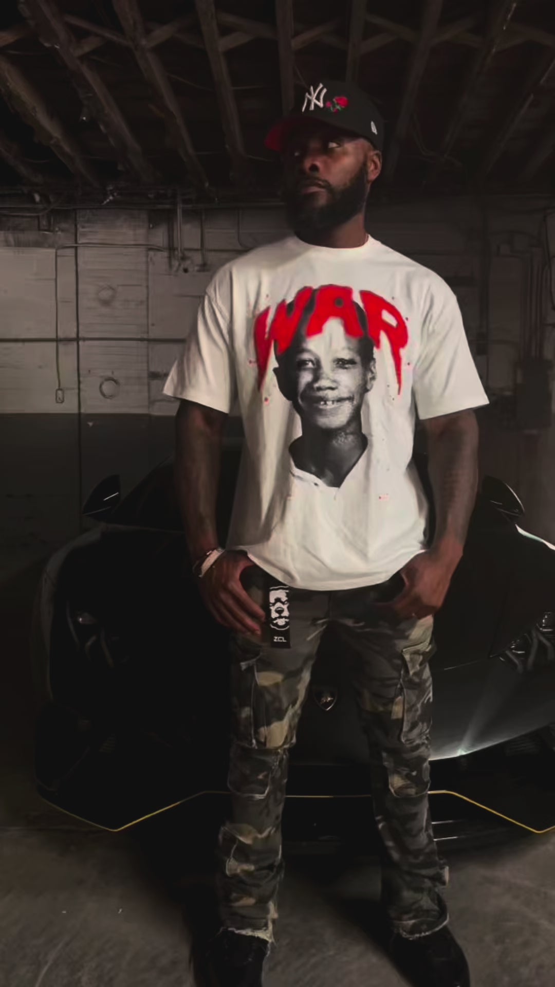 WAR T-Shirt, We Are Resilient, Malcolm X, Young Malcolm X, Positive Affirmation, Motivational Clothing, Inspirational Shirt, Streetwear, Graphic Tee, Oversized T-Shirt, Boxy Fit, Hip Hop Fashion, Urban Wear, Empowerment, Resilience, Strength, Black History, Positive Energy, Manifestation, High Vibe Clothing, Law of Attraction